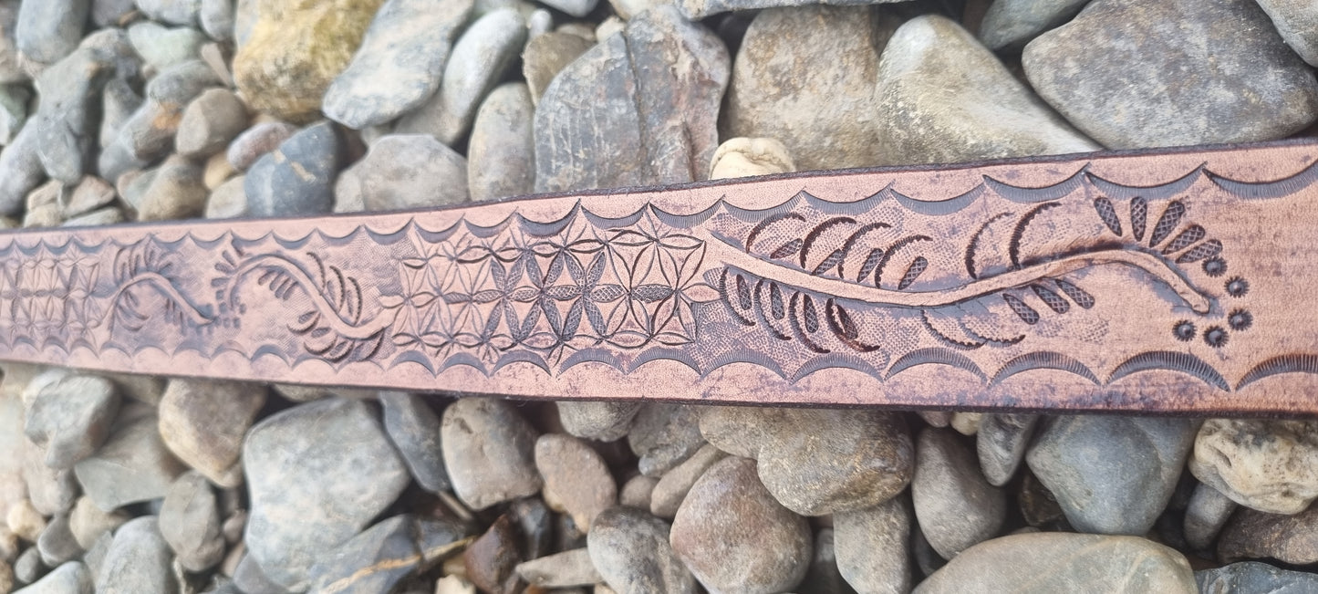 Stamped and carved leather belt