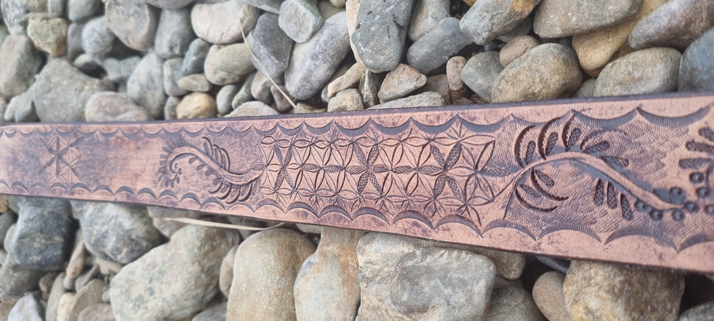 Stamped and carved leather belt