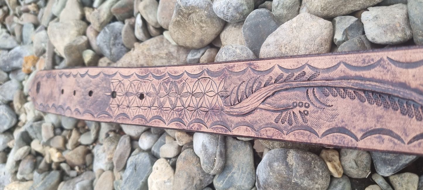 Stamped and carved leather belt