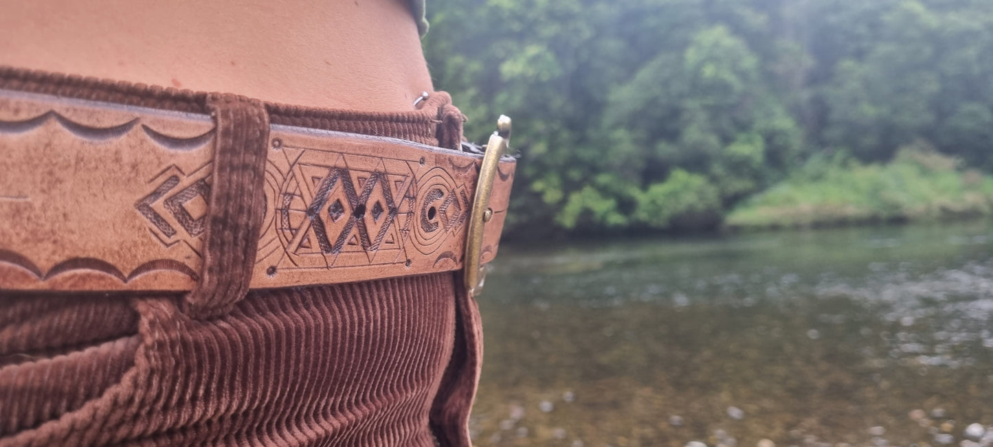 Stamped and carved leather belt