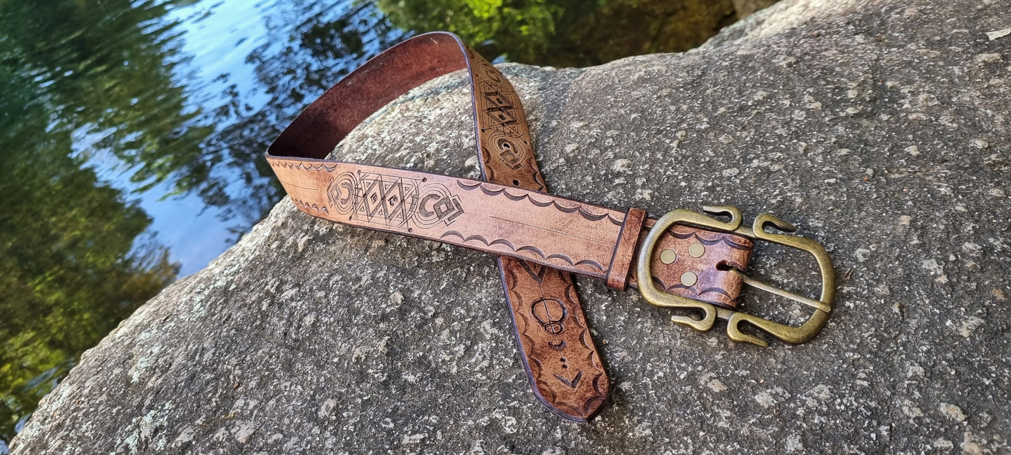 Stamped and carved leather belt