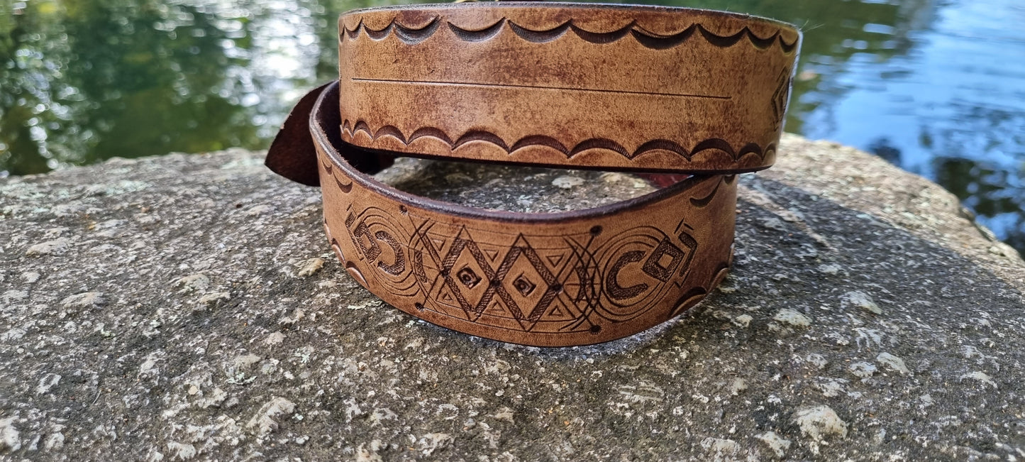 Stamped and carved leather belt