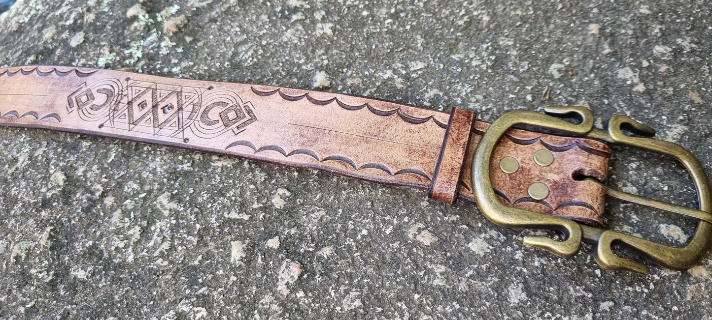 Stamped and carved leather belt