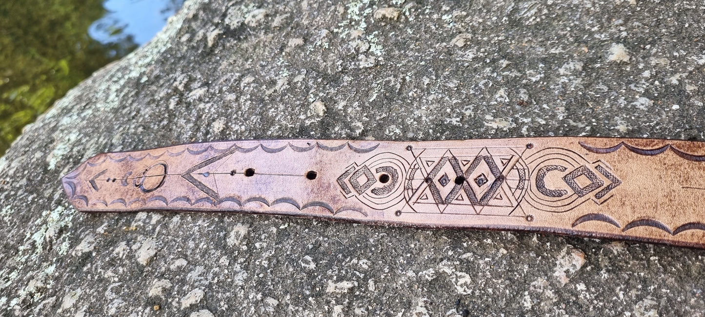 Stamped and carved leather belt