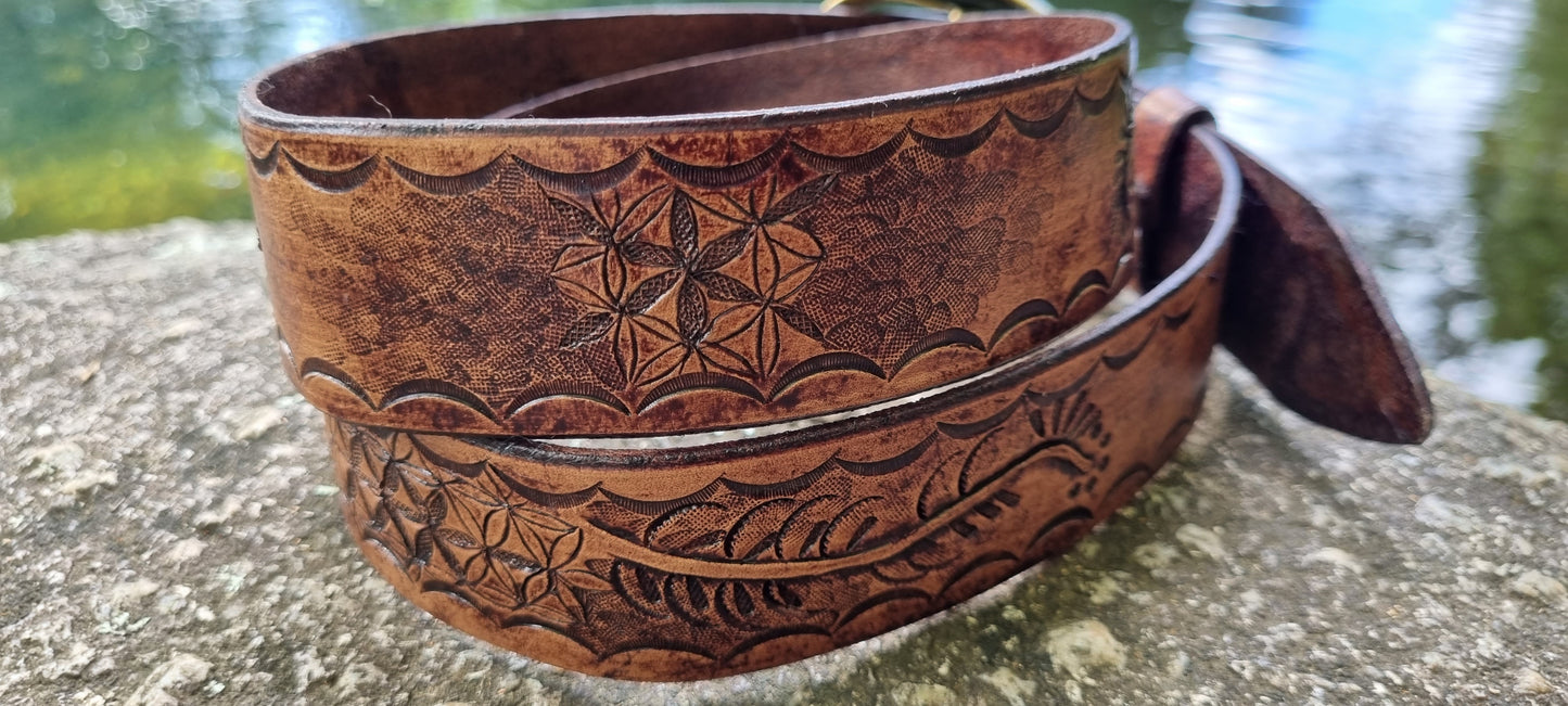 Stamped and carved leather belt