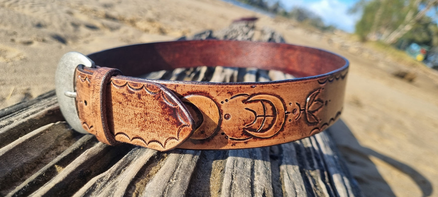 Custom stamped and carved leather belt