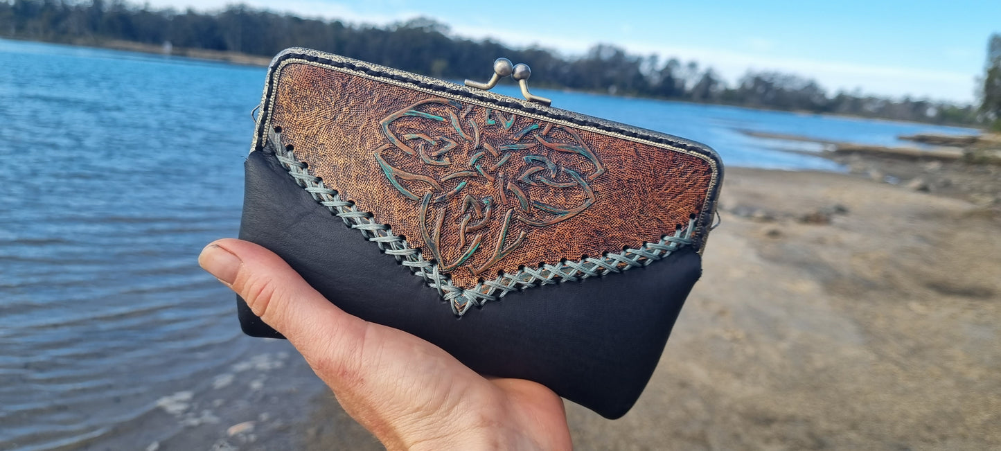 Carved clip purse