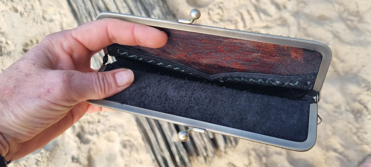 Carved clip purse