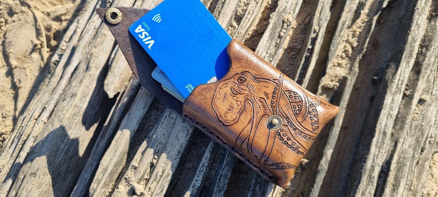 Carved octopus card holder