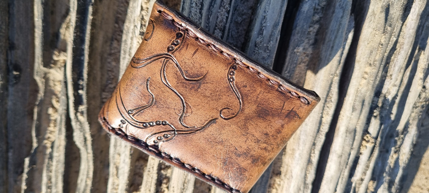 Carved octopus card holder