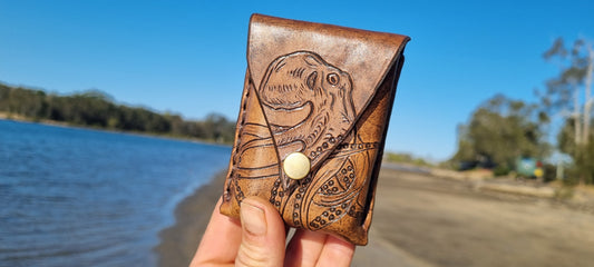 Carved octopus card holder