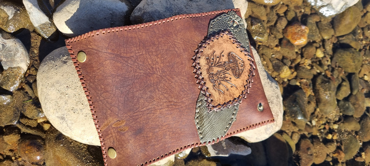 Carved tobacco pouch