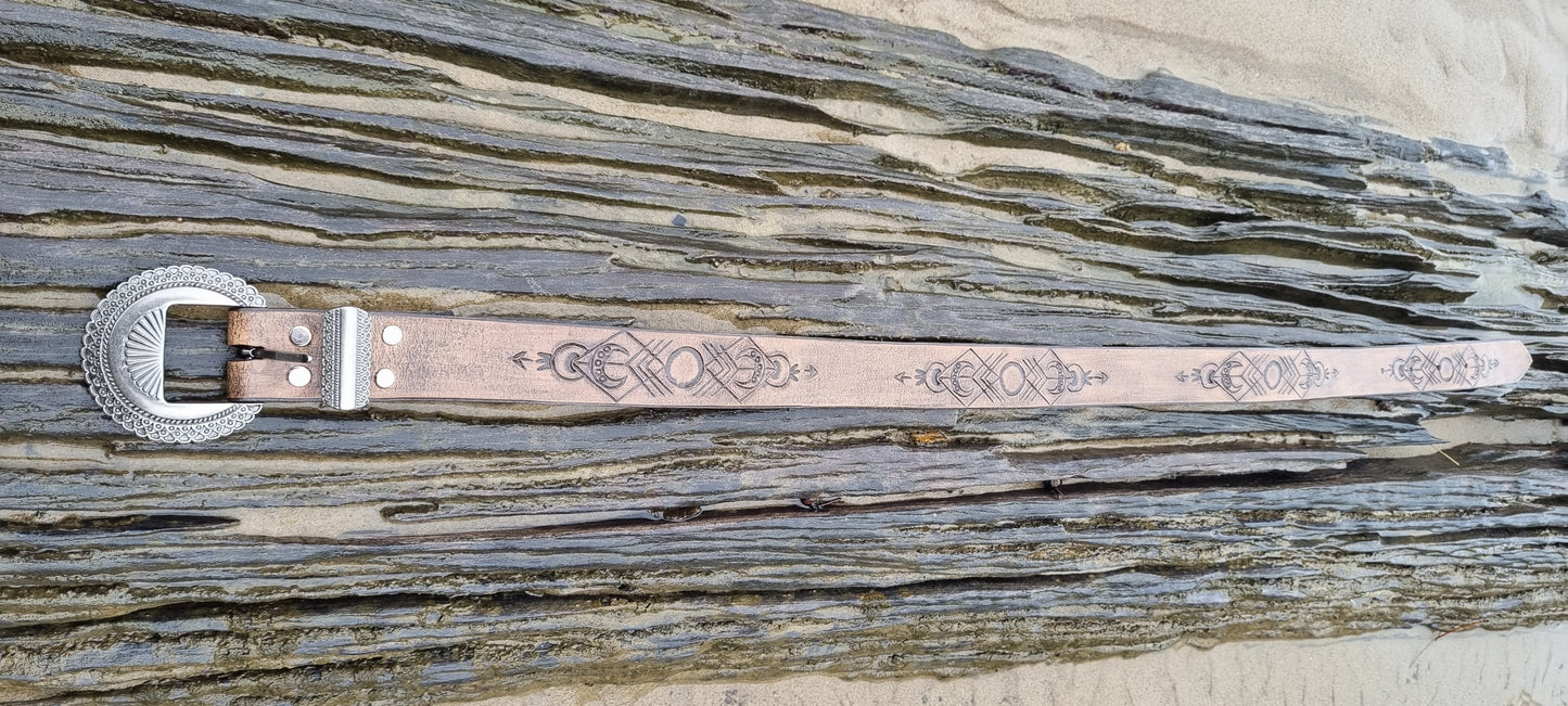 Carved leather belt