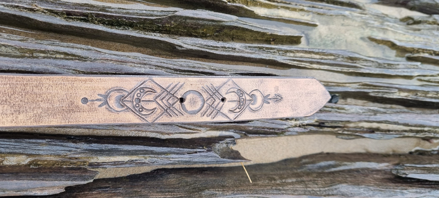 Carved leather belt