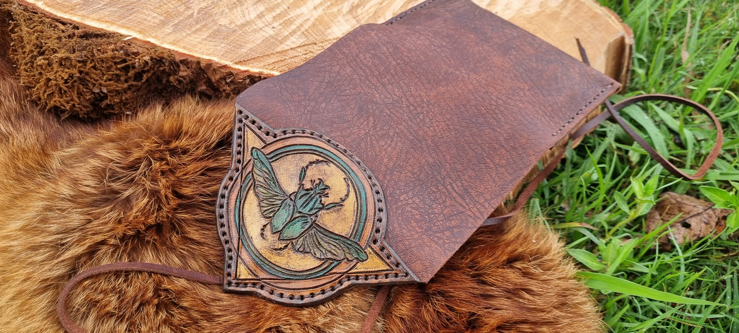 Carved scarob beetle tobacco pouch