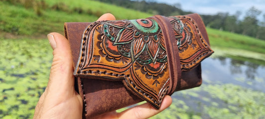 Carved tobacco pouch