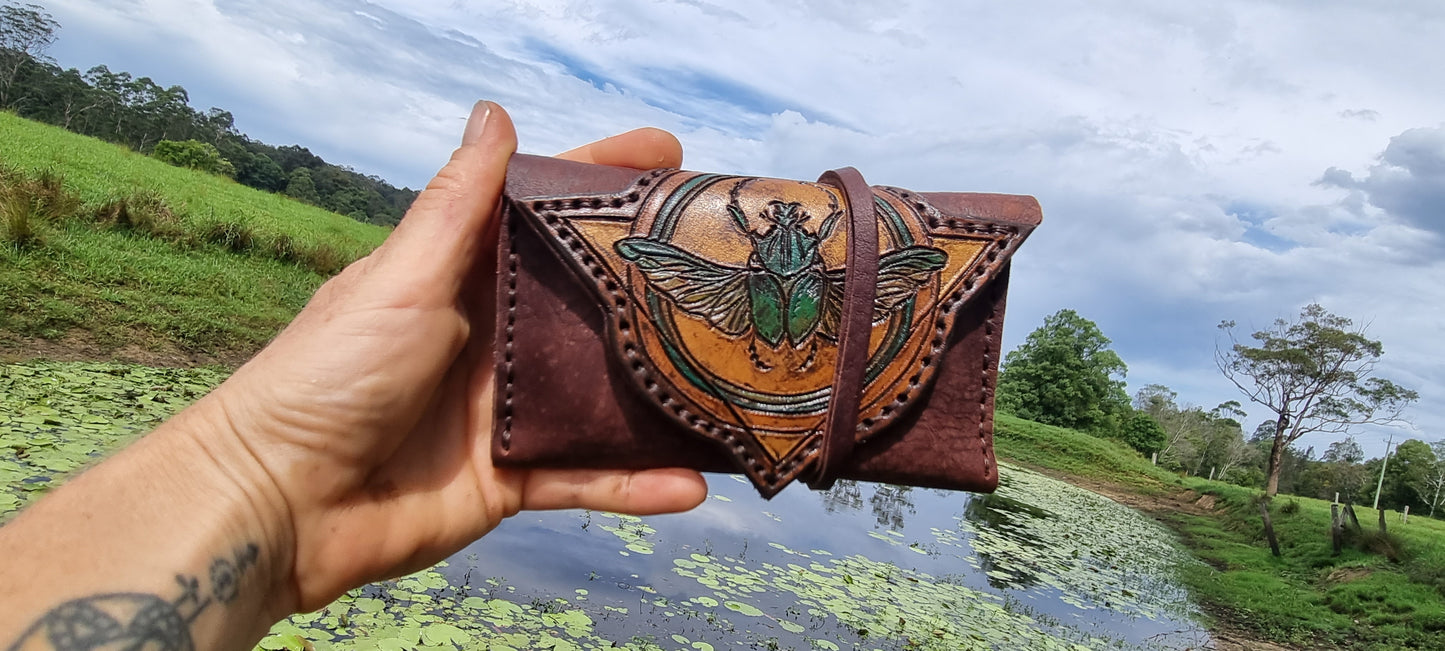 Carved scarob beetle tobacco pouch