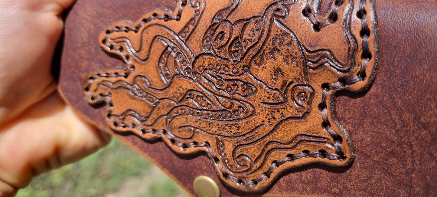 Carved octopus purse