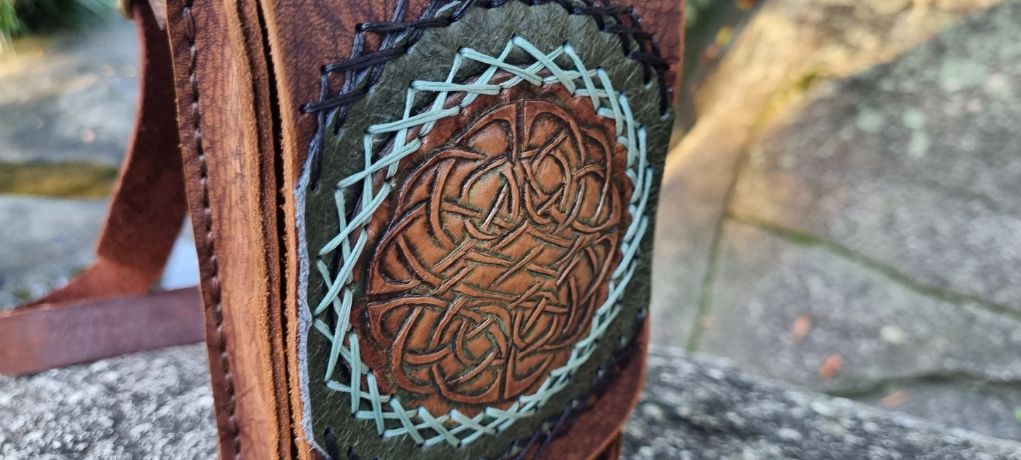Carved water bottle bag