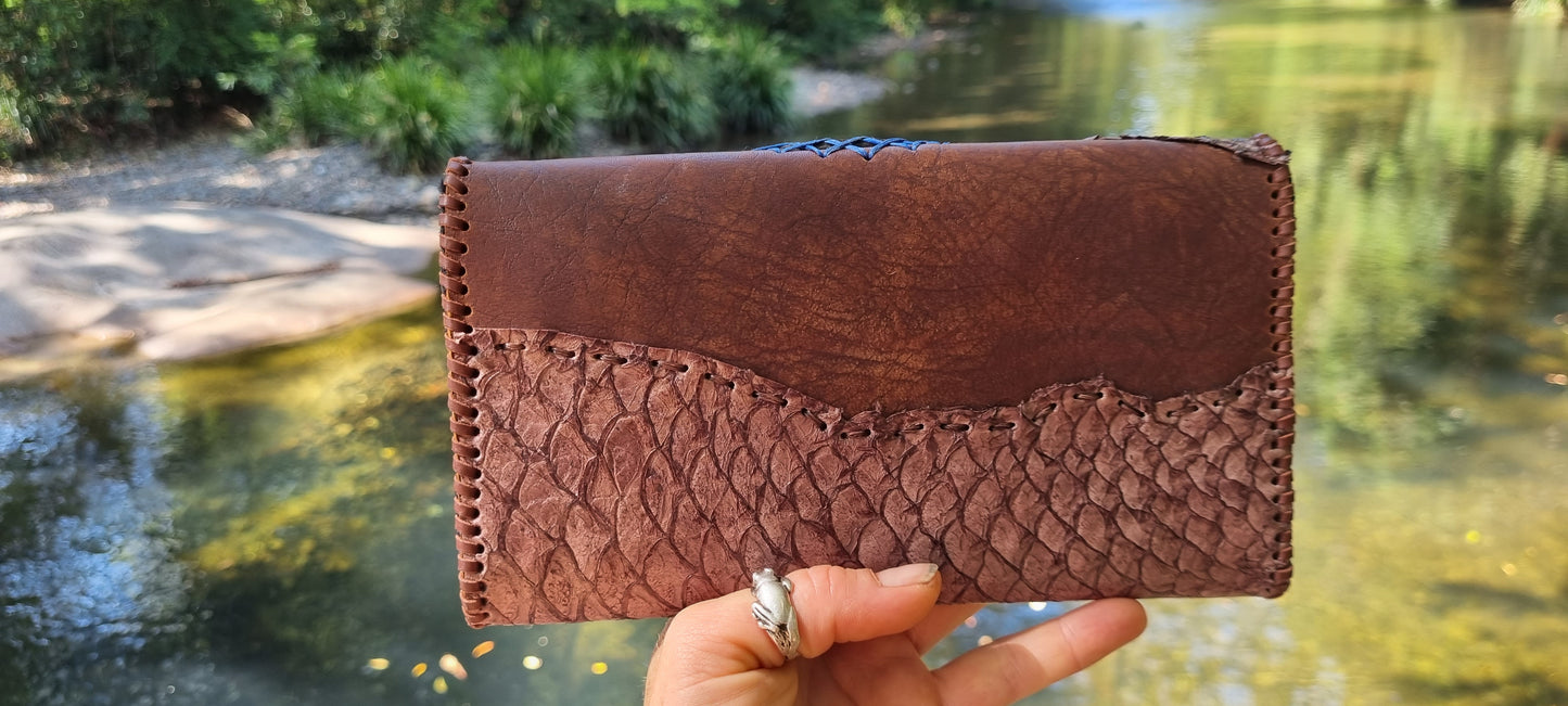 Carved dolphin purse