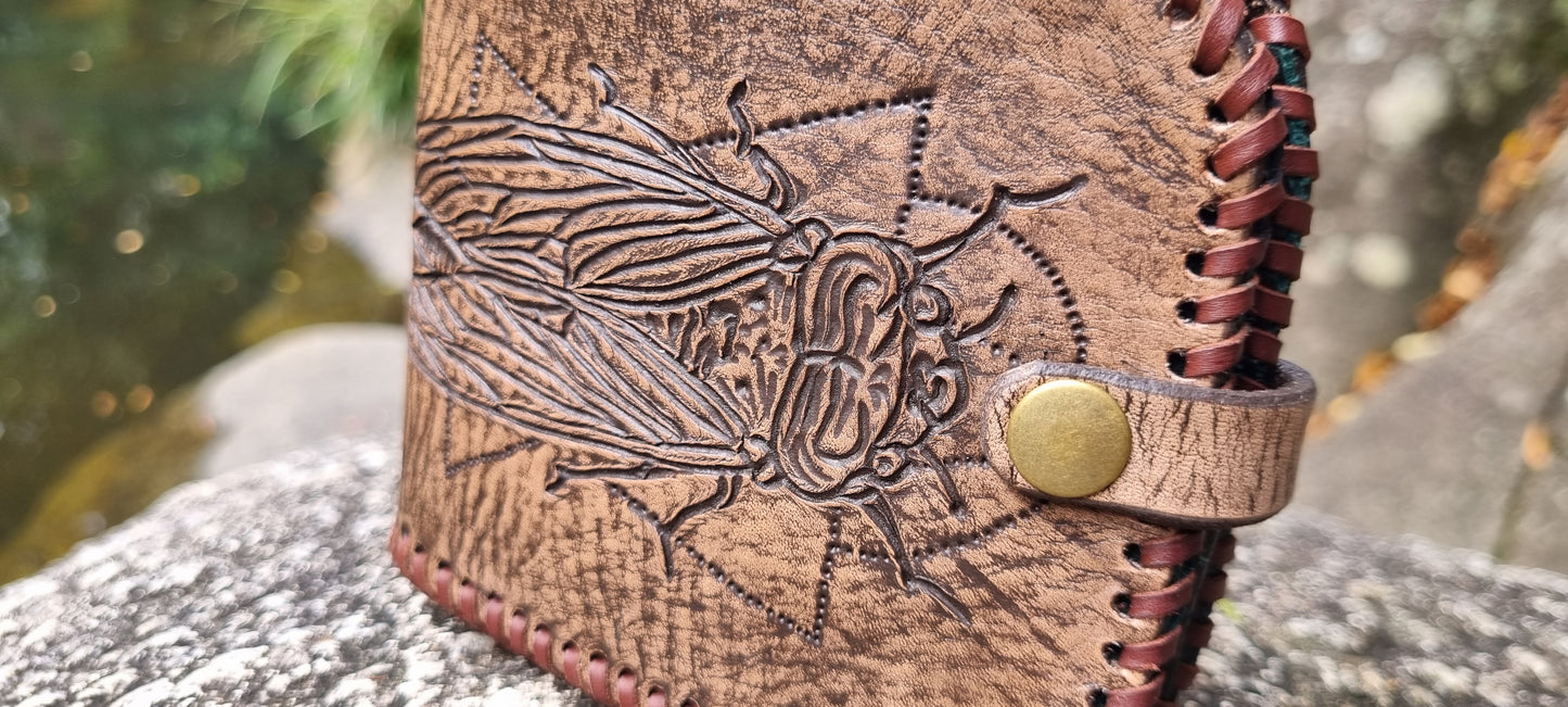 Custom carved cicada wallet