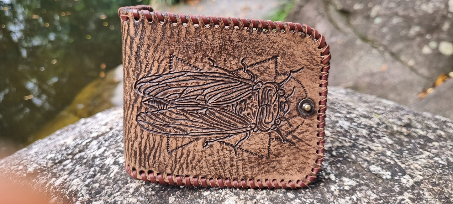 Custom carved cicada wallet