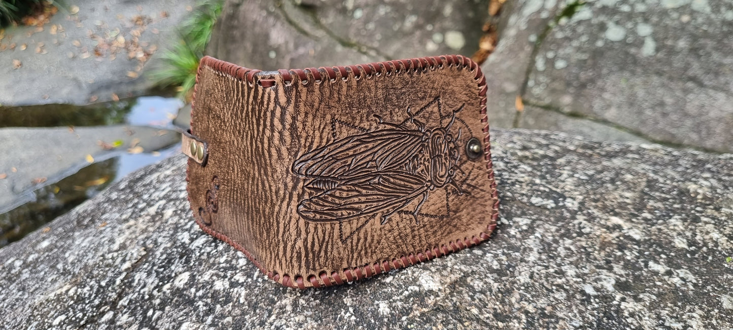 Custom carved cicada wallet