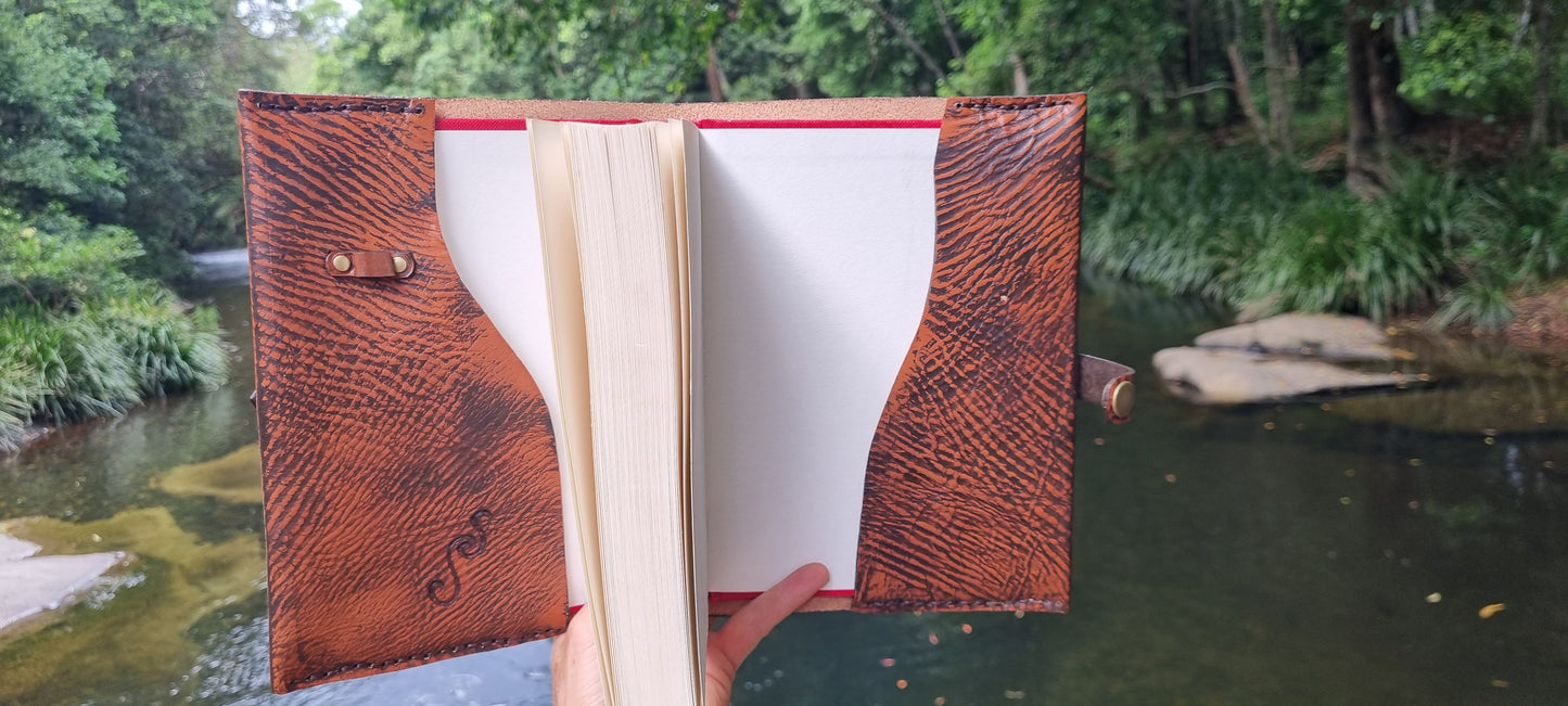 Carved journal cover with tigers eye