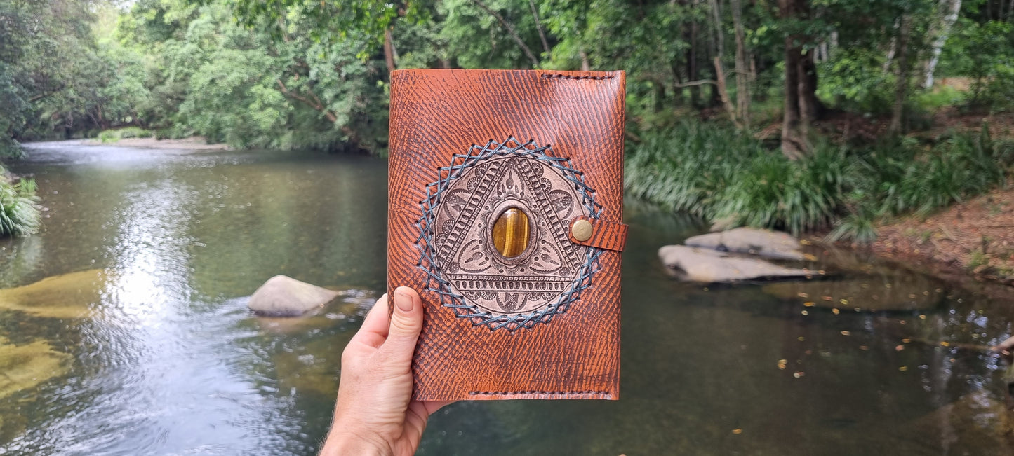 Carved journal cover with tigers eye