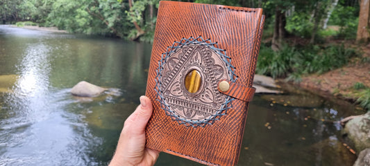 Carved journal cover with tigers eye