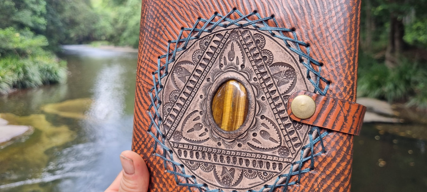 Carved journal cover with tigers eye