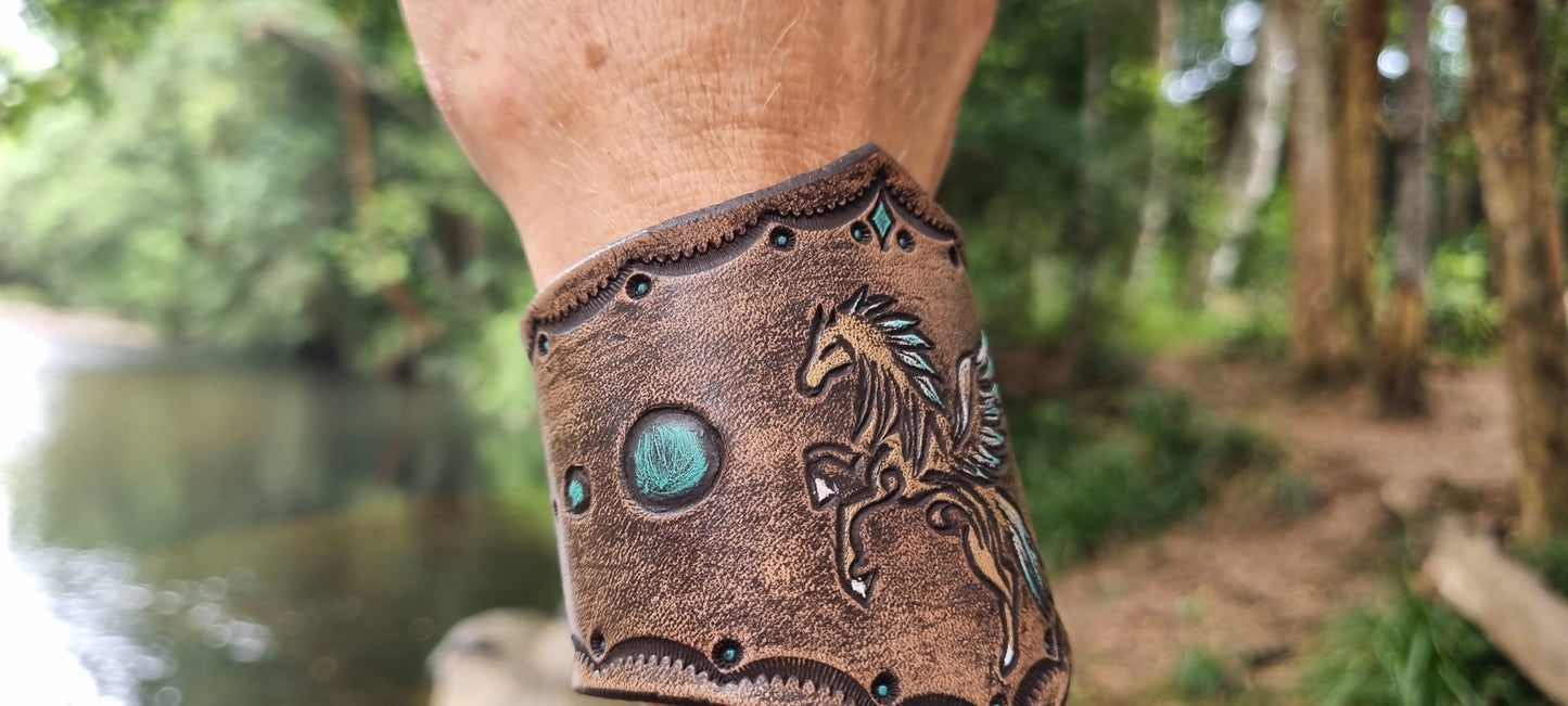 Caeved horse design leather cuff