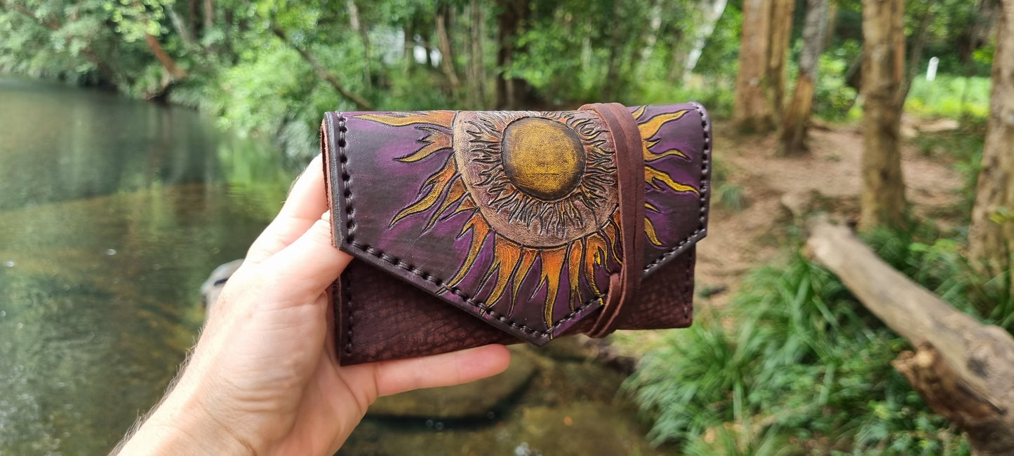 Carved 'Sun' tobacco pouch