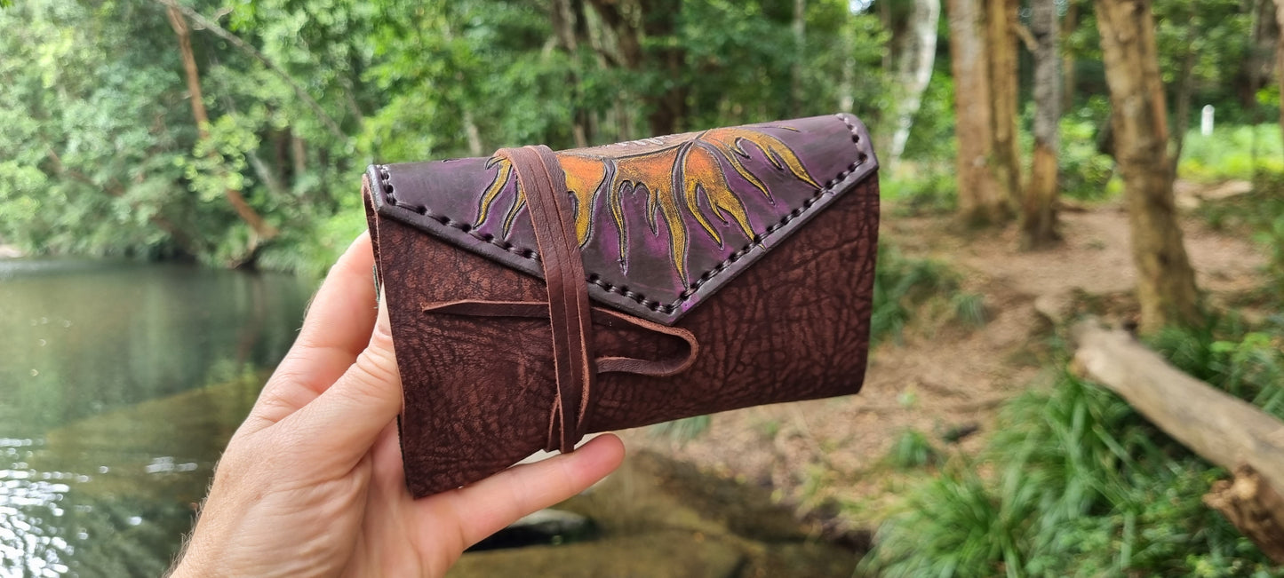 Carved 'Sun' tobacco pouch