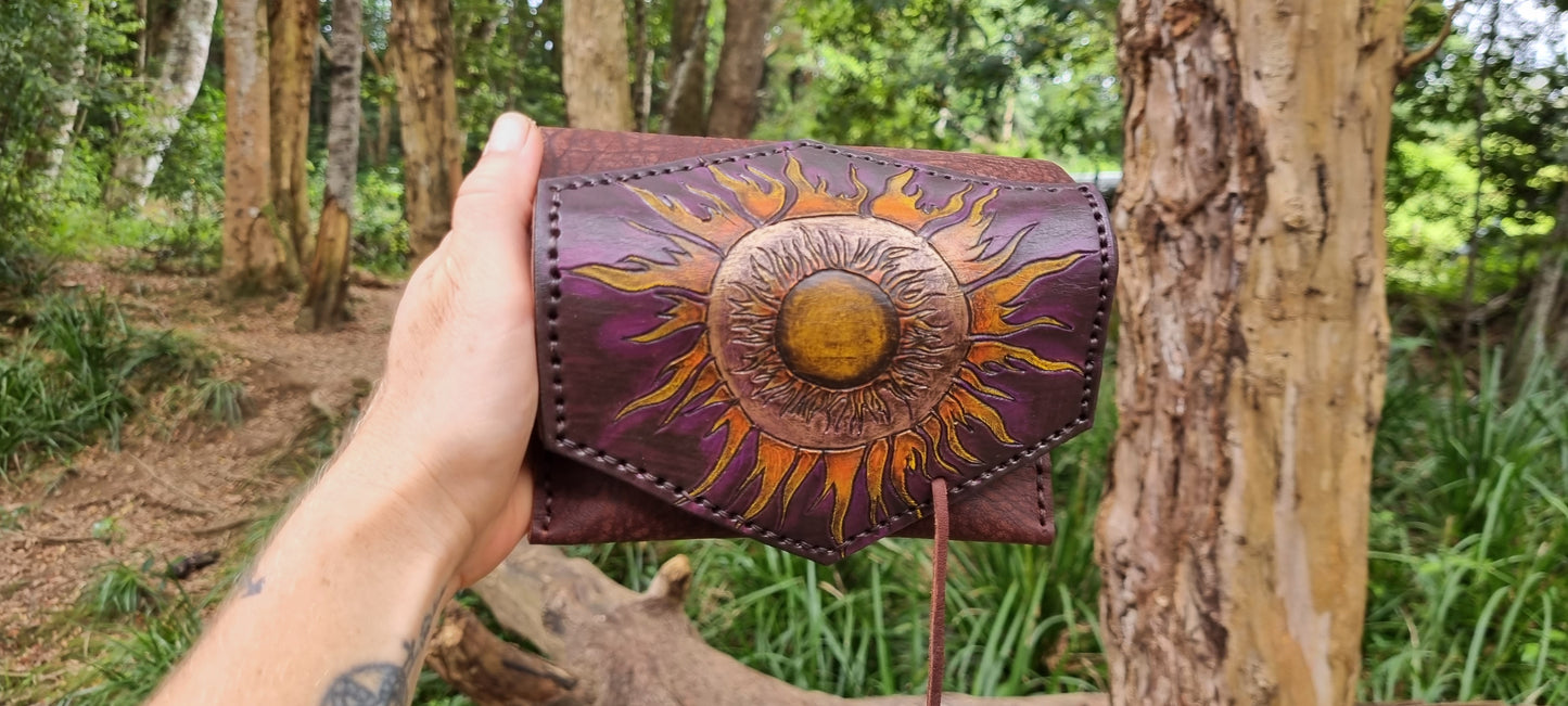 Carved 'Sun' tobacco pouch