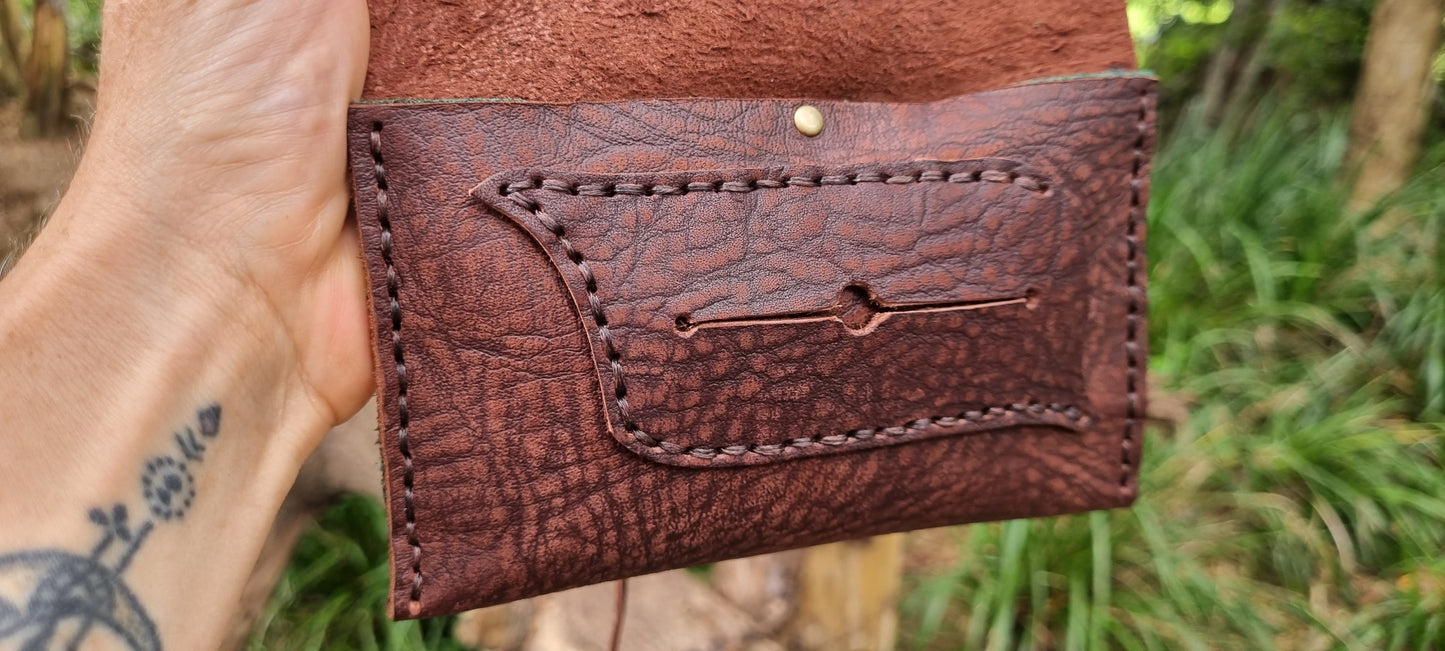 Carved 'Sun' tobacco pouch