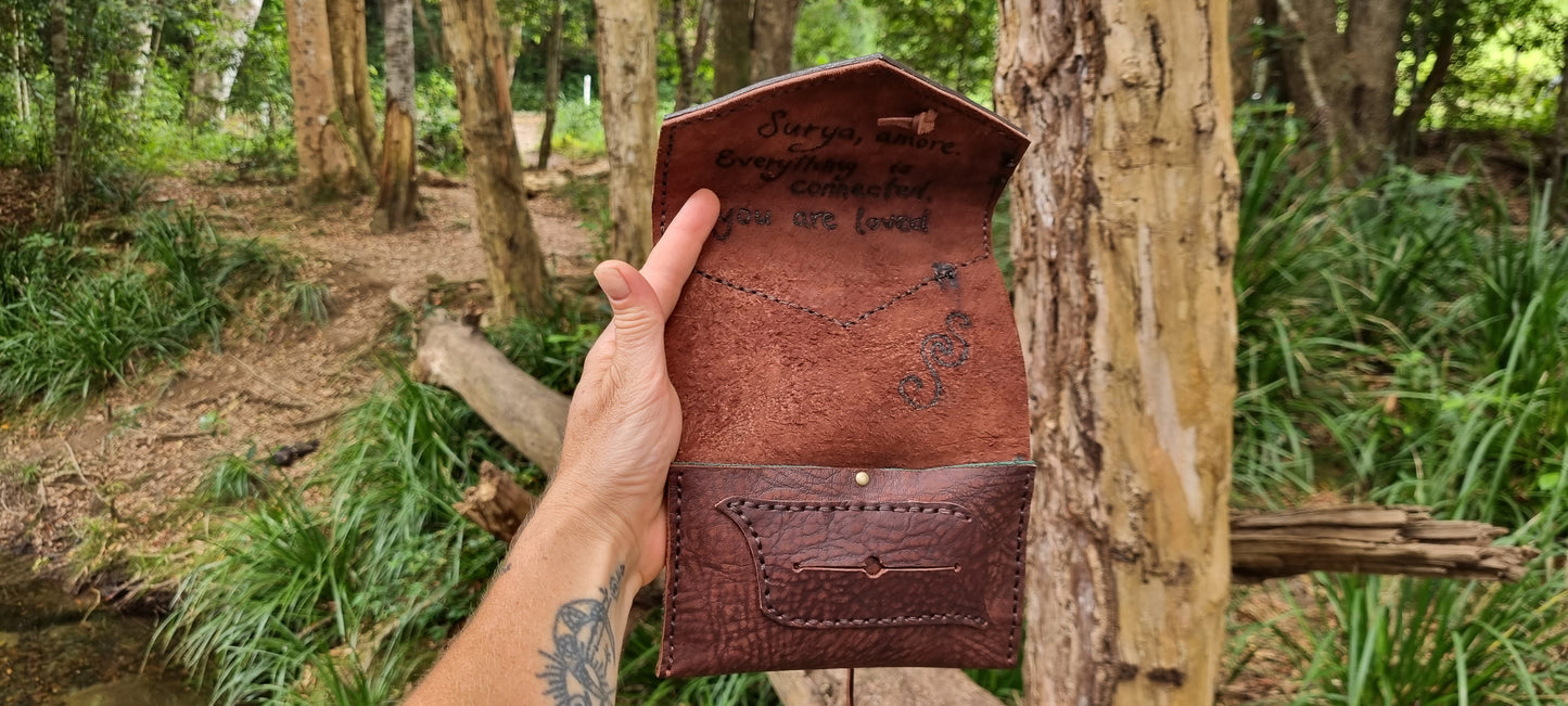 Carved 'Sun' tobacco pouch